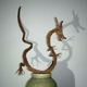 Illustration for article titled Godzilla Made from Pine Tree Branches Is a Lovely Fire Hazard